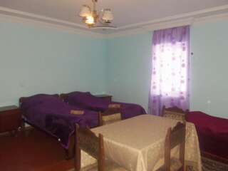 Гостевой дом Valodia Guest House In Mestia Местиа Четырехместный номер-10